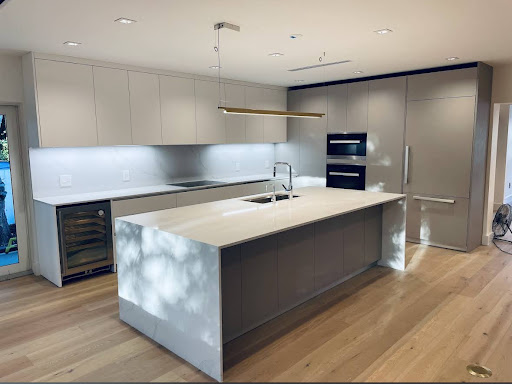 Italkraft modern kitchen with marble island and pendant light